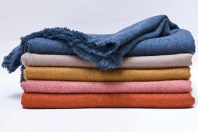 Area Home Liam Throw, a fluid, silky-soft luxury blanket